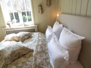 Ένα ή περισσότερα κρεβάτια σε δωμάτιο στο Liigerwal