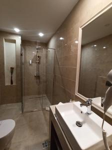 Kúpeľňa v ubytovaní Hotel Lazaro