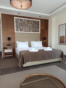 Posteľ alebo postele v izbe v ubytovaní Hotel Lazaro