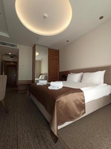 Giường trong phòng chung tại Hotel Lazaro