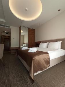 Posteľ alebo postele v izbe v ubytovaní Hotel Lazaro