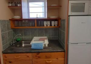 
A kitchen or kitchenette at Adagio Luxury Self Catering
