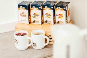 Příslušenství pro přípravu čaje a kávy v ubytování Gästehaus DEULA + 6 fotografií