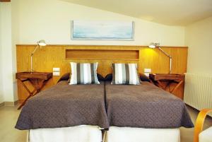Cama o camas de una habitación en Hotel Llafranch