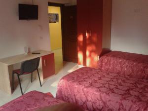 Voodi või voodid majutusasutuse Albergo Ma.Re toas