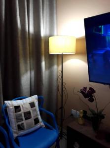 En TV eller et underholdningssystem på Apartamento Capitolio