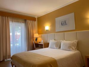 Кровать или кровати в номере Hotel Mare