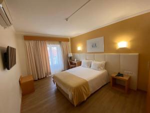 Кровать или кровати в номере Hotel Mare