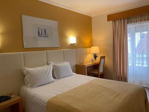 Кровать или кровати в номере Hotel Mare