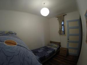 Postel nebo postele na pokoji v ubytování Lemuria Hostel