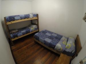 Postel nebo postele na pokoji v ubytování Lemuria Hostel
