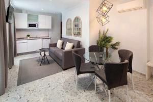Posedenie v ubytovaní Wanderlust Malaga Apartamentos 1
