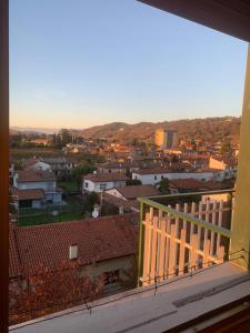 a view of a city from a balcony at Friuli Appartamenti in Cormòns +5 photos