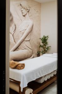Postel nebo postele na pokoji v ubytování Hotel Barcode Wellness & Spa