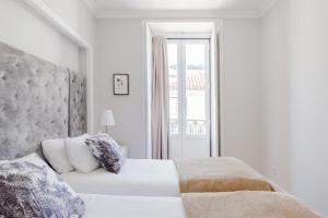Cama o camas de una habitación en Lisbon Center V