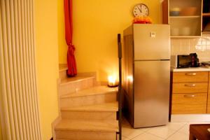 A kitchen or kitchenette at Villa Sole