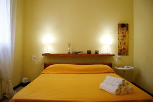A bed or beds in a room at Villa Sole