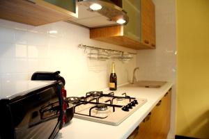 A kitchen or kitchenette at Villa Sole