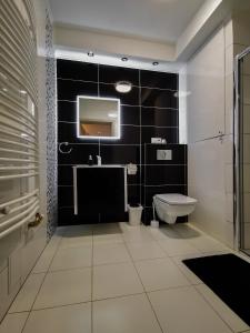Koupelna v ubytování Apartament Kopydło + 4 fotografie