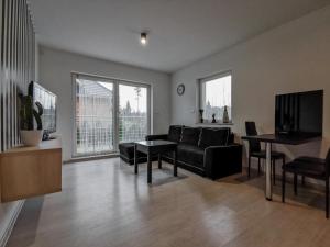 TV a/nebo společenská místnost v ubytování Apartament Kopydło