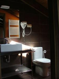 Ένα μπάνιο στο Hotel Areulo