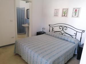 Postel nebo postele na pokoji v ubytování I Mirti - Home Holiday