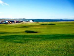 Golfe no chalé alpino ou nos arredores