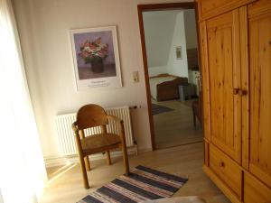 Postel nebo postele na pokoji v ubytování Haus-Halligblick-Ferienwohnung-Langenness