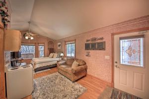 a living room with a couch and a chair at Homey Pet-Friendly Libby Cottage with Yard by Creek! in White Haven