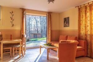 Zona d'estar a Whg-1-Schwalbennest-Ferienhaus-Am-Boddenufer-Buschvitz