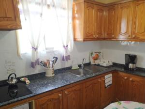 Kuchnia lub aneks kuchenny w obiekcie Casa Nazario Duplex