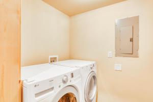 a laundry room with a white washer and dryer at Meyer Mountain Home in Soda Springs