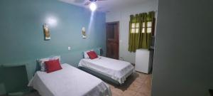 Кровать или кровати в номере Hotel Vale do Rio