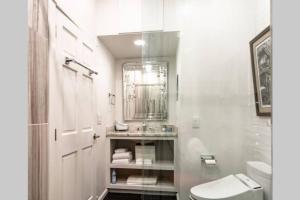 A bathroom at Private Luxury Suite with Hot Tub Downtown Eureka Springs