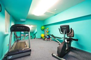 a gym with two exercise bikes in a room at Whalers Rest in Forfar