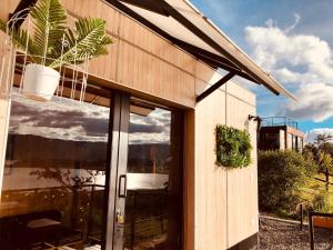 Zahrada ubytování EnCubo Glamping Guatavita