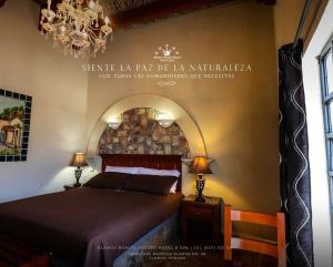 Ein Bett oder Betten in einem Zimmer der Unterkunft Álamos Bonito Resort