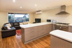 A kitchen or kitchenette at Eagle Bay Beach House
