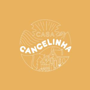 een logo voor een reisbureau met een huis en de woorden casa carolina bij Mountainhome Casa Cancelinha in Soito