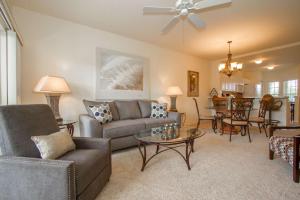 a living room with a couch and a table at Coral Falls- Celeste Dr./Lely in Belle Meade