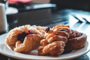 a plate of pastries sitting on a table at Royal St. Andrews Hotel, Spa and Conference Centre in Port Alfred