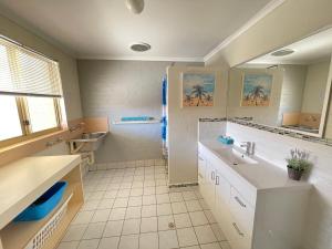 A bathroom at Shark Bay Seafront Apartments