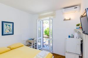 Kuchyňa alebo kuchynka v ubytovaní Room Bruna