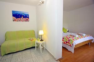 Postel nebo postele na pokoji v ubytování Apartments Omo 1