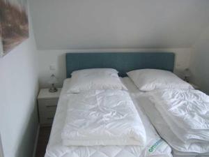 Łóżko lub łóżka w pokoju w obiekcie Piratennest-1