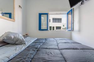 Ένα ή περισσότερα κρεβάτια σε δωμάτιο στο Casa Caleta de Caballo