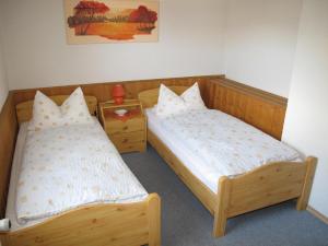 Postel nebo postele na pokoji v ubytování Ferienhaus-Haidweg-Wohnung-3