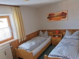 Postel nebo postele na pokoji v ubytování Ferienhaus-Haidweg-Wohnung-3