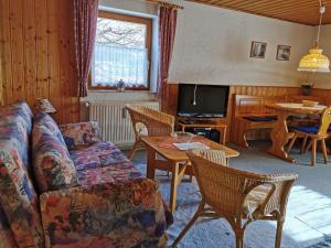 Posezení v ubytování Ferienhaus-Haidweg-Wohnung-3
