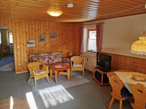 Posezení v ubytování Ferienhaus-Haidweg-Wohnung-3